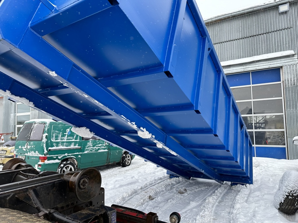 Blue container in snow